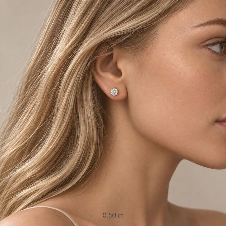 Pure Solitaire Stud Earrings in 18K gold, pair of diamond solitaire studs
