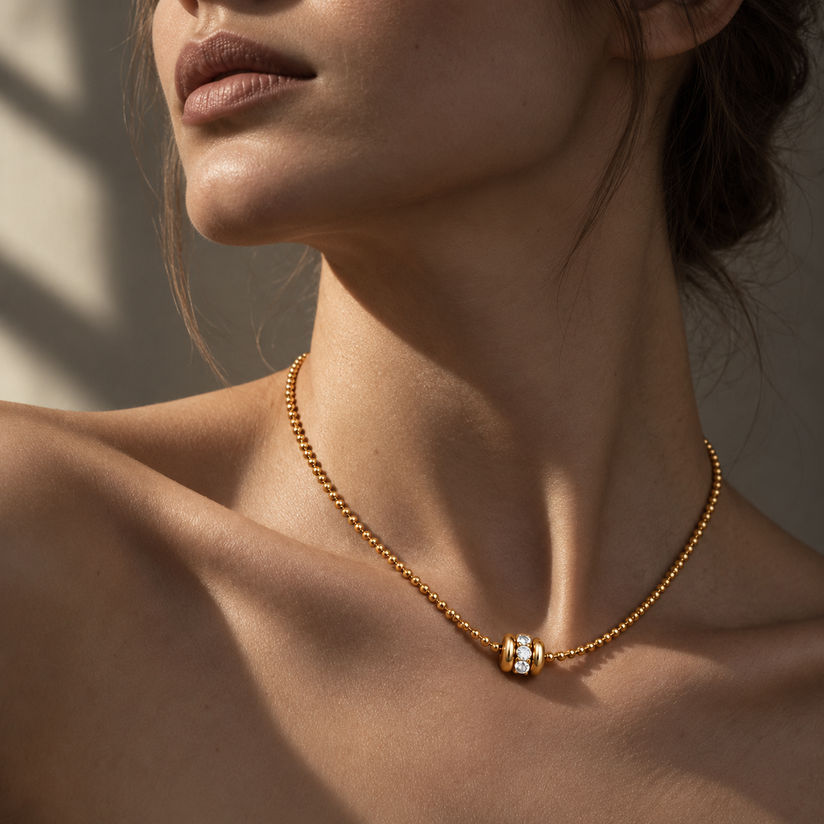 Gold Bead Necklace with Diamond Duo – Luminara worn, 18K yellow gold bead chain with its diamond centrepiece resting at the collarbone