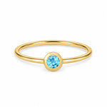 Blue Topaz December birthstone solitaire ring in 18K yellow gold – Aquae Jewels