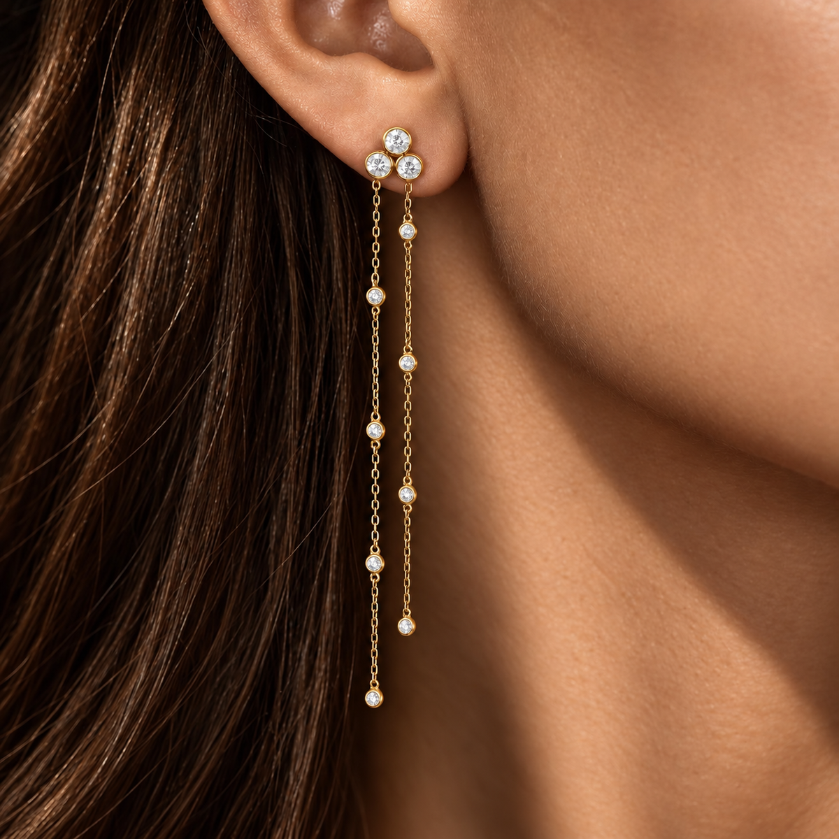 Britney Love Earrings worn on the ear, solid 18K gold and diamonds, by Aquae Jewels