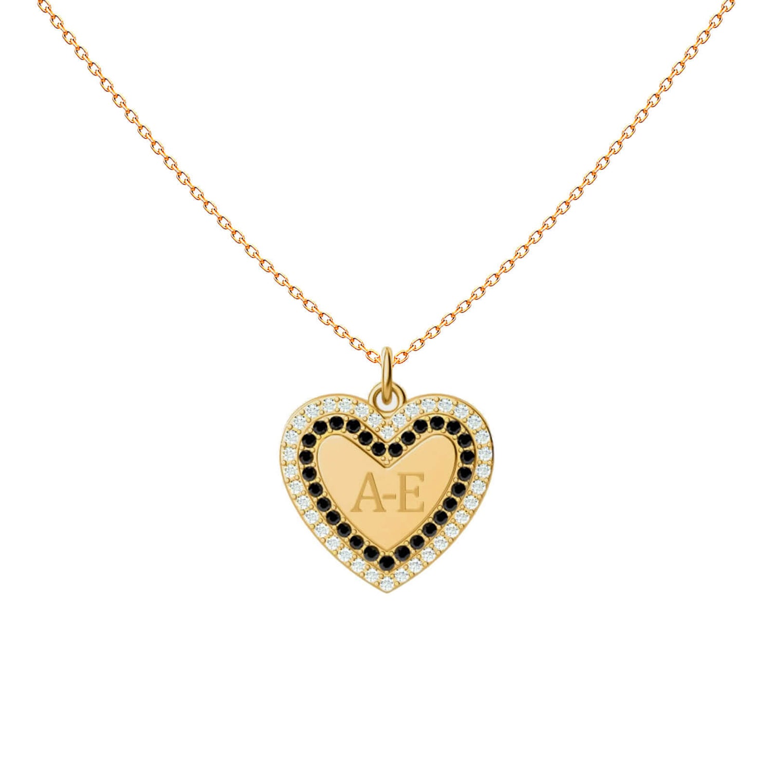 Black and white diamond monogram heart necklace in 18K yellow gold