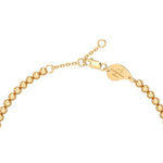 18K gold lobster clasp with Aquae Jewels signature medallion on beaded chain