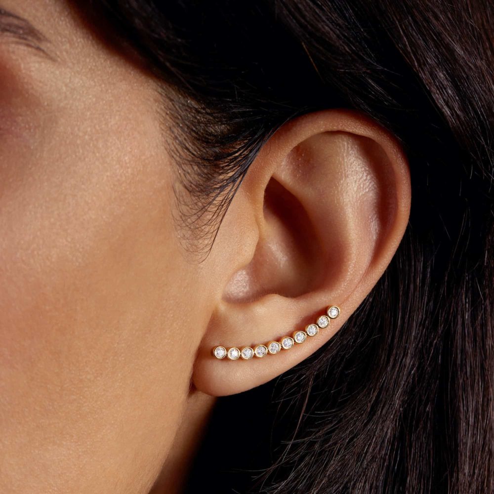 Boucle d'oreille en or 18 carats (une seule pièce)