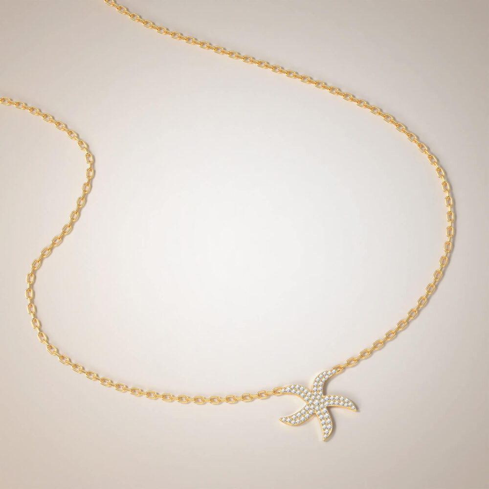 collana con ciondolo a forma di stella marina in oro